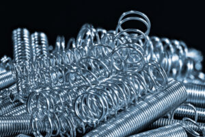 What kind of metal are springs usually made from?